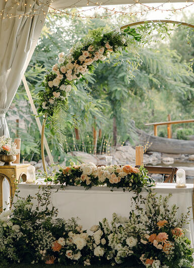 classic fairytale / sweetheart table on-site arch / white, blush, peach / White August Photography
